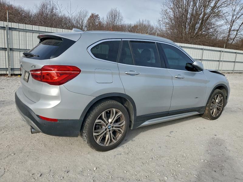 Photo 3 from auction – 2017 BMW X1 XDRIVE2 with VIN WBXHT3Z34H4A54324