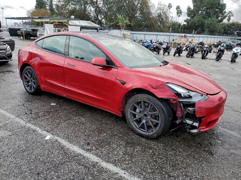 Photo 4 from auction – 2022 TESLA MODEL 3 with VIN 5YJ3E1EA8NF338096