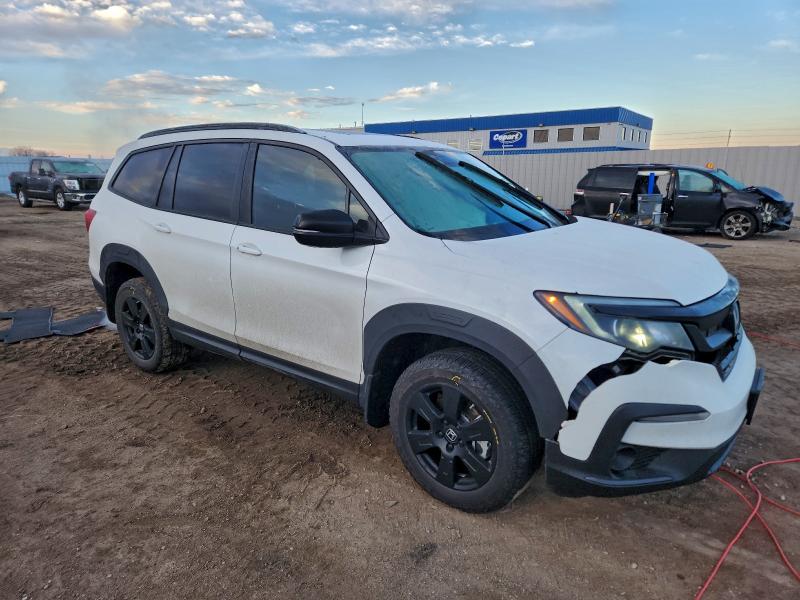 Photo 4 from auction – 2022 HONDA PILOT TRAI with VIN 5FNYF6H81NB022192