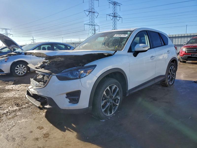 MAZDA CX-5 GT 2016 with VIN JM3KE4DYXG0673641 - Photo from auction