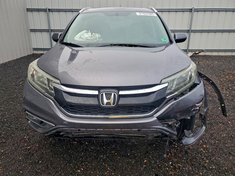 Photo 5 from auction – 2015 HONDA CR-V EXL with VIN 2HKRM4H75FH604045