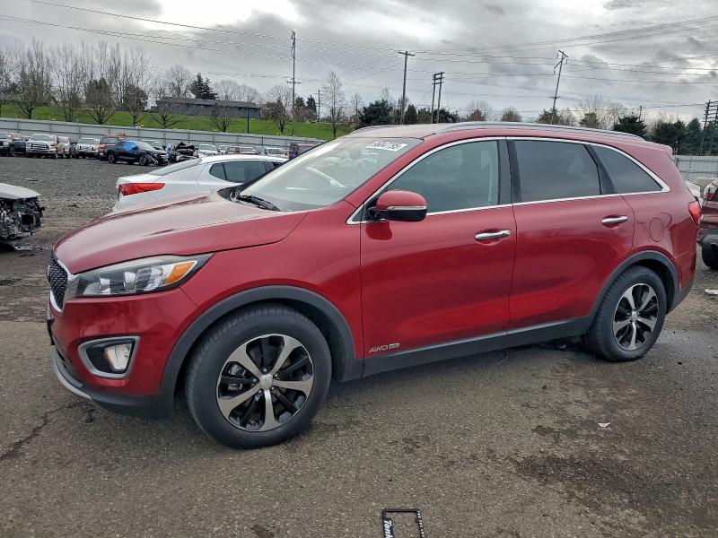 KIA SORENTO EX 2016 with VIN 5XYPHDA52GG110156 - Photo from auction