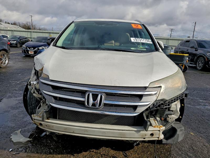 Photo 5 from auction – 2014 HONDA CR-V with VIN 5J6RM4H73EL119259
