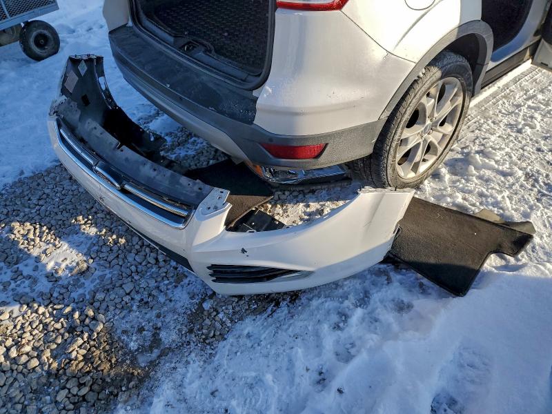 Photo 12 from auction – 2015 FORD ESCAPE TIT with VIN 1FMCU9J96FUB89642