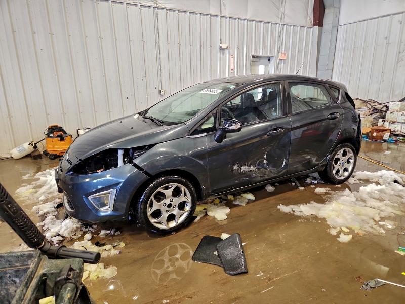 FORD FIESTA SES 2011 with VIN 3FADP4FJ6BM100873 - Photo from auction