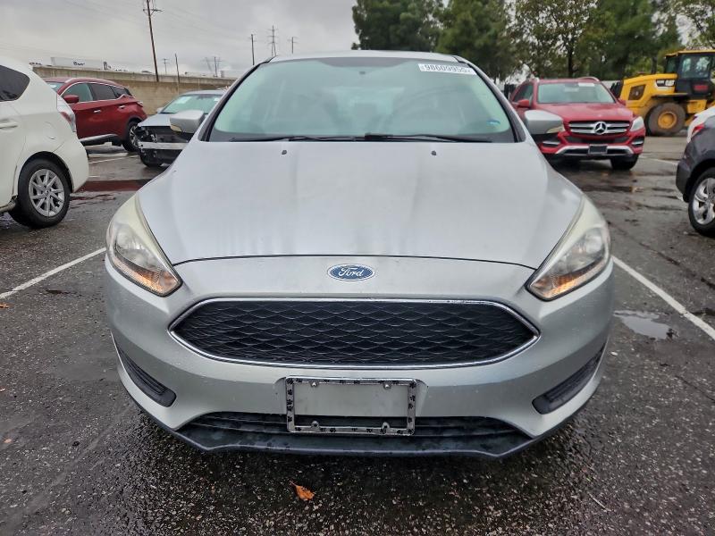Foto 5 de la subasta – 2015 FORD FOCUS SE con VIN 1FADP3K24FL301056