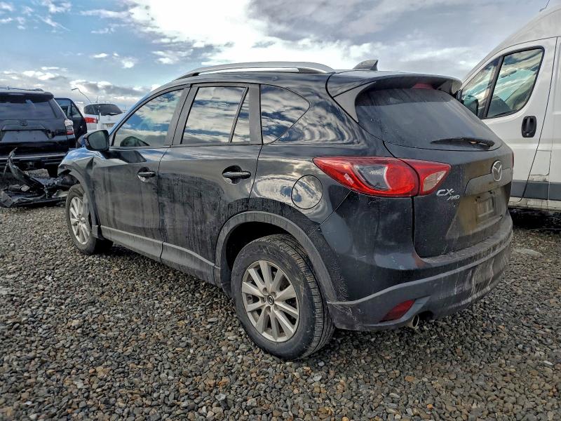 Photo 2 from auction – 2014 MAZDA CX-5 TOURI with VIN JM3KE4CY0E0409164