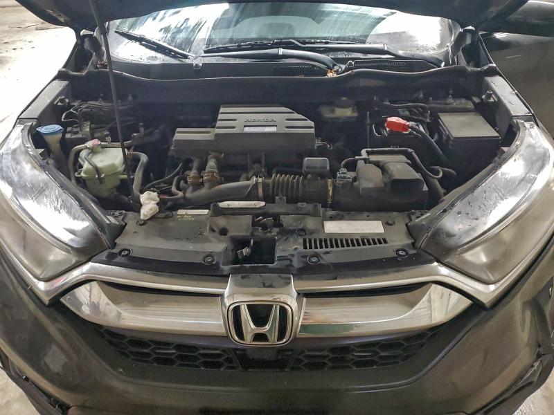 Photo 12 from auction – 2018 HONDA CR-V with VIN 2HKRW2H81JH635583