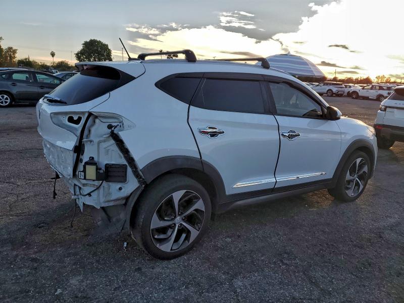 Photo 3 from auction – 2016 HYUNDAI TUCSON LIM with VIN KM8J33A21GU188572