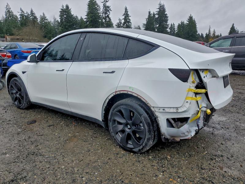 Photo 2 from auction – 2021 TESLA MODEL Y with VIN 5YJYGDEE2MF210214