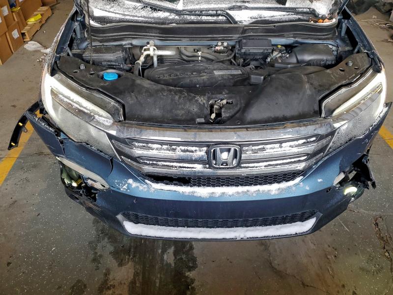 Photo 12 from auction – 2016 HONDA PILOT EXL with VIN 5FNYF6H53GB080863