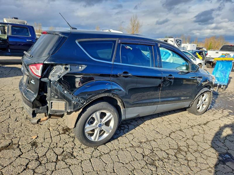 Photo 3 from auction – 2016 FORD ESCAPE SE with VIN 1FMCU9G99GUC67811
