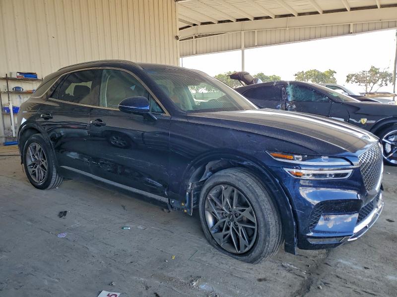 Photo 4 from auction – 2023 GENESIS GV70 BASE with VIN KMUMADTB0PU136406