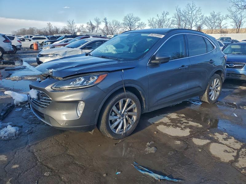 FORD ESCAPE TIT 2021 with VIN 1FMCU9J93MUB11736 - Photo from auction