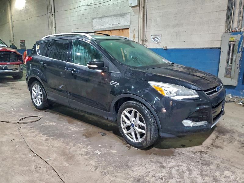 Photo 4 from auction – 2015 FORD ESCAPE TIT with VIN 1FMCU9J98FUC22835