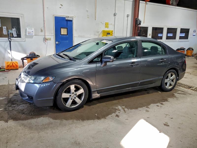HONDA CIVIC LX 2010 with VIN 19XFA1F59AE001625 - Photo from auction