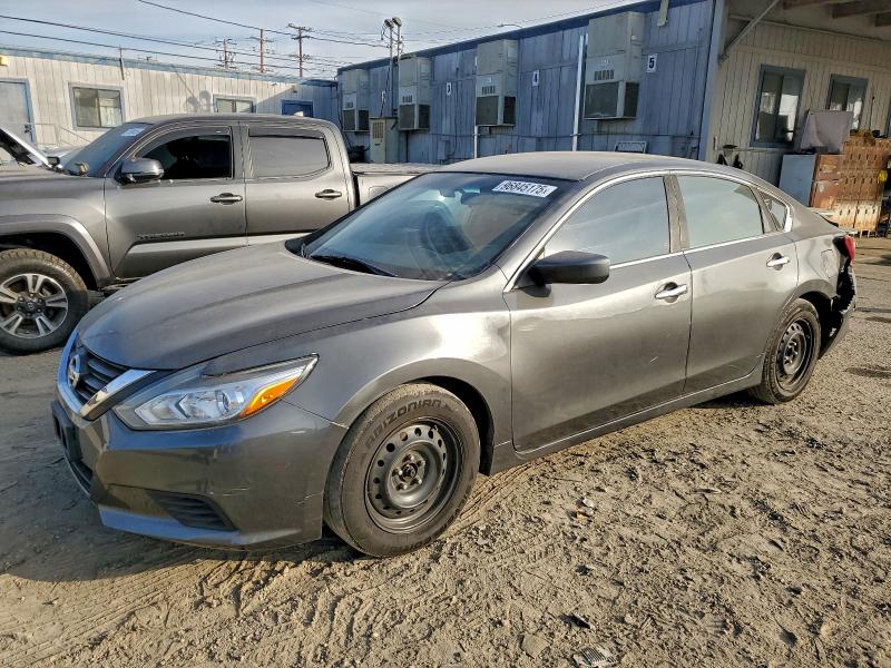 NISSAN ALTIMA 2.5 2016 with VIN 1N4AL3AP0GC264567 - Photo from auction