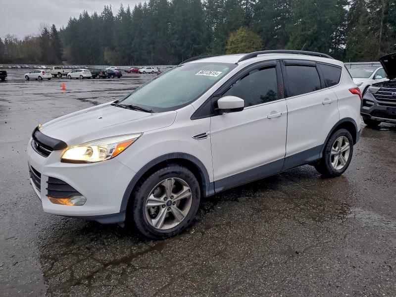 FORD ESCAPE SE 2015 with VIN 1FMCU9GX0FUB82000 - Photo from auction