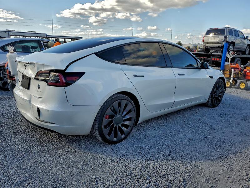 Photo 3 from auction – 2021 TESLA MODEL 3 with VIN 5YJ3E1EC4MF049457