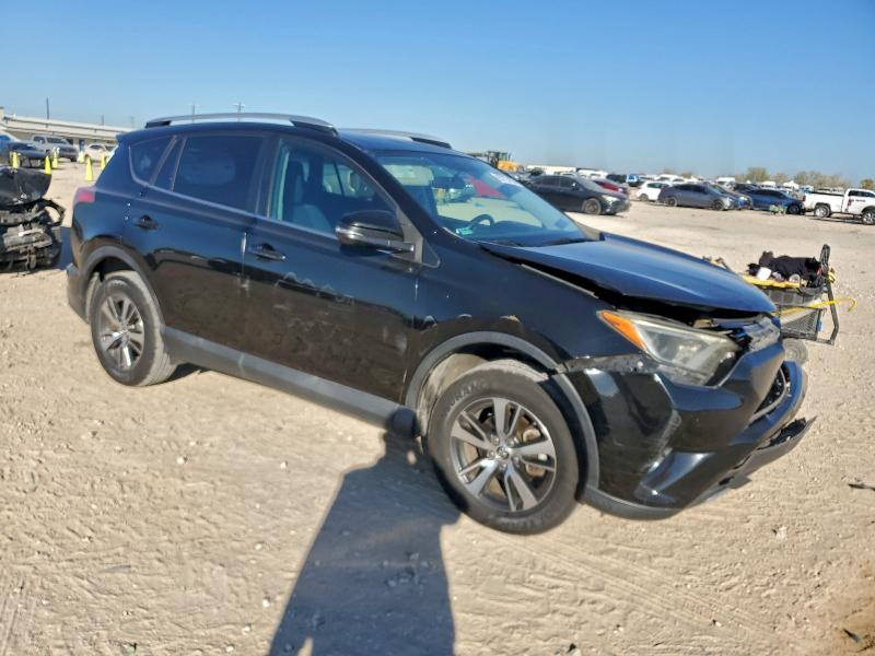 Photo 4 from auction – 2016 TOYOTA RAV4 with VIN 2T3WFREV4GW243074