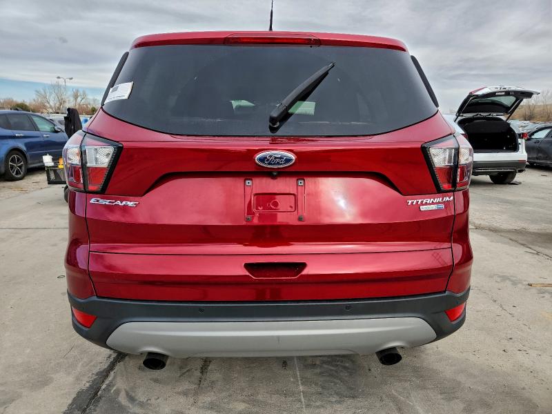 Photo 6 from auction – 2018 FORD ESCAPE TIT with VIN 1FMCU9J94JUC62306