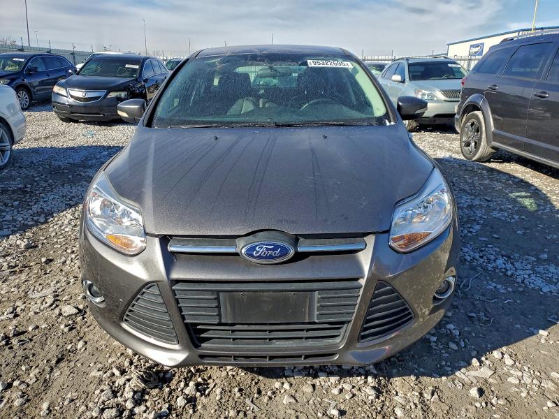 Foto 5 de la subasta – 2013 FORD FOCUS SE con VIN 1FADP3K20DL215904