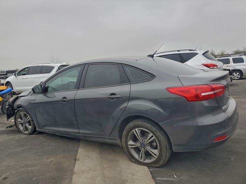 Photo 2 from auction – 2018 FORD FOCUS SE with VIN 1FADP3FEXJL223900