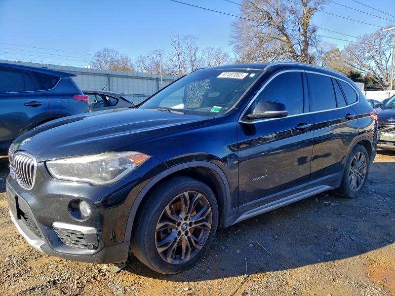 BMW X1 XDRIVE2 2016 with VIN WBXHT3Z33G4A50294 - Photo from auction