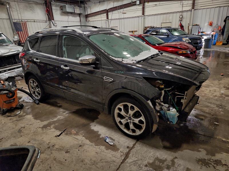 Photo 4 from auction – 2015 FORD ESCAPE TIT with VIN 1FMCU9J93FUB26191