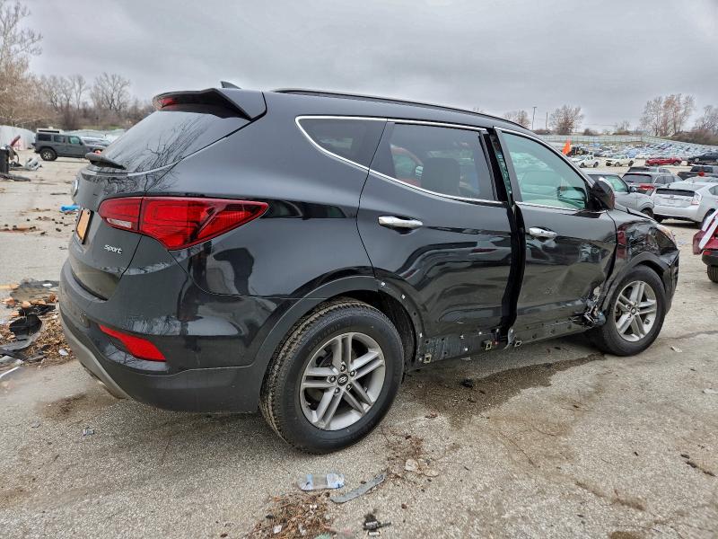 Photo 3 from auction – 2017 HYUNDAI SANTA FE S with VIN 5NMZU3LB8HH052126