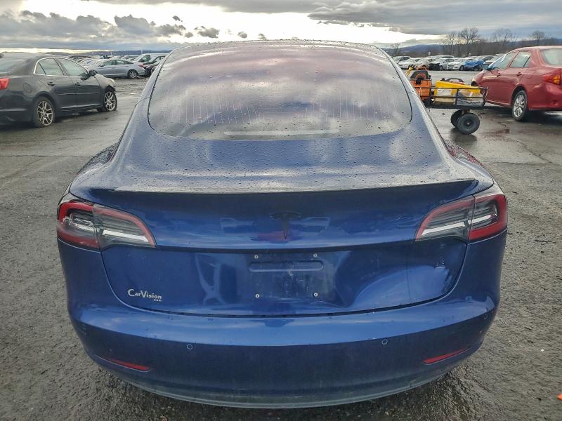 Photo 6 from auction – 2018 TESLA MODEL 3 with VIN 5YJ3E1EA1JF034165