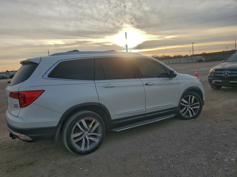 Photo 3 from auction – 2018 HONDA PILOT ELIT with VIN 5FNYF6H01JB022410