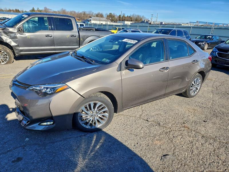 TOYOTA COROLLA L 2019 with VIN 2T1BURHE2KC186506 - Photo from auction
