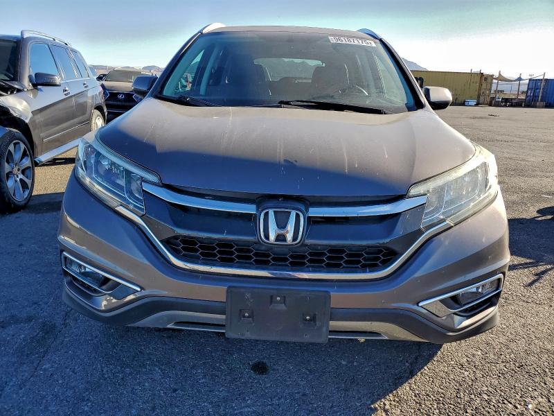 Photo 5 from auction – 2015 HONDA CR-V EXL with VIN 2HKRM4H73FH678905