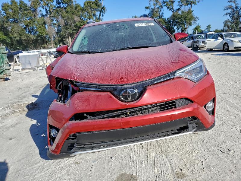 Photo 5 from auction – 2016 TOYOTA RAV4 LIMIT with VIN 2T3YFREV0GW310875