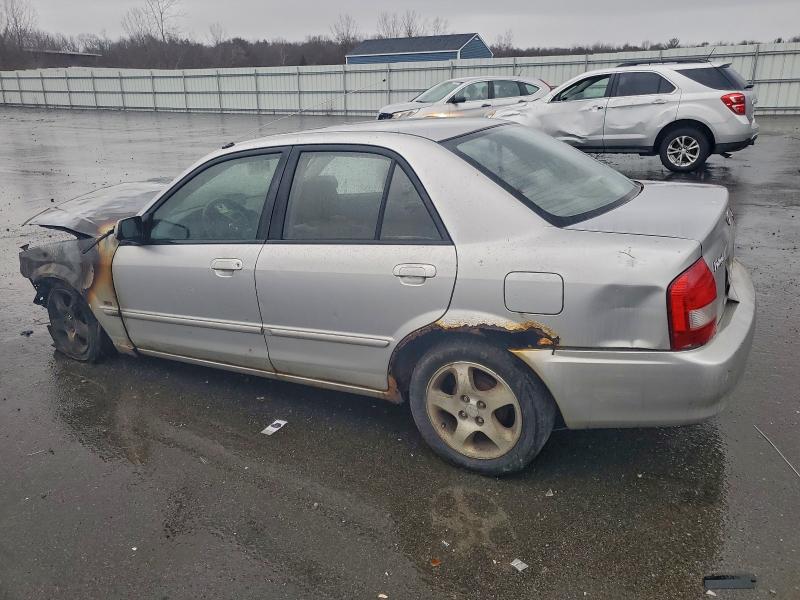 Photo 2 from auction – 2002 MAZDA PROTEGE DX with VIN JM1BJ225520525021