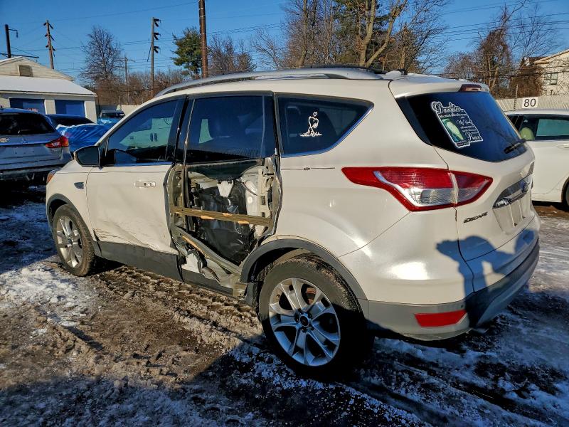 Photo 2 from auction – 2014 FORD ESCAPE with VIN 1FMCU9J92EUE45094