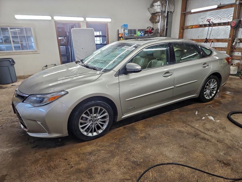 TOYOTA AVALON HYB 2016 with VIN 4T1BD1EB6GU053202 - Photo from auction