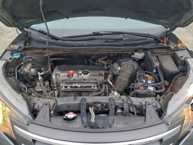 Photo 12 from auction – 2014 HONDA CR-V LX with VIN 2HKRM4H36EH660491