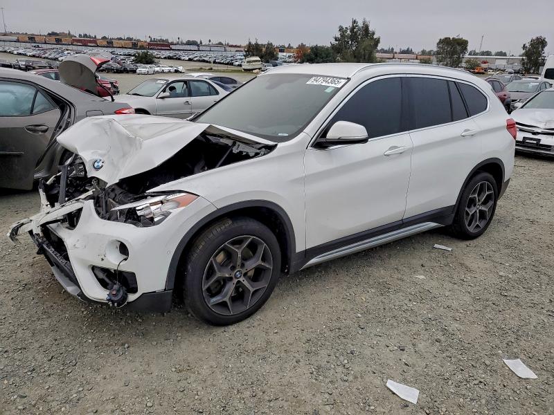 BMW X1 2018 with VIN WBXHU7C36J5L08710 - Photo from auction