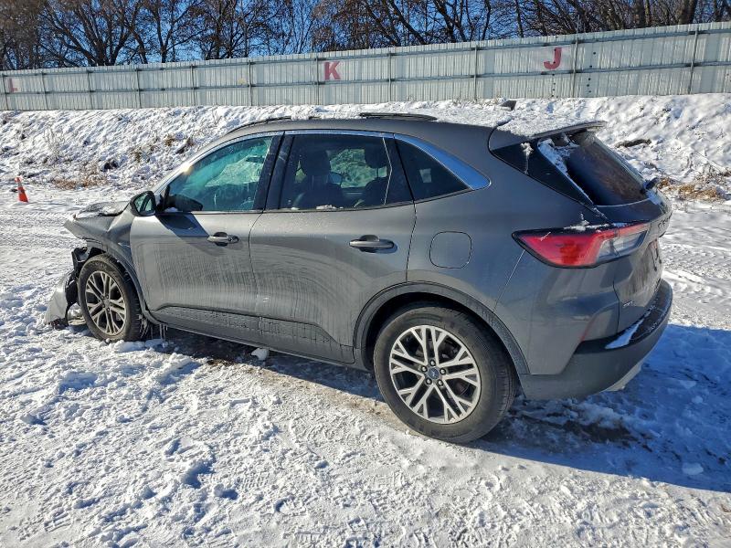 Photo 2 from auction – 2021 FORD ESCAPE with VIN 1FMCU9H68MUA64621