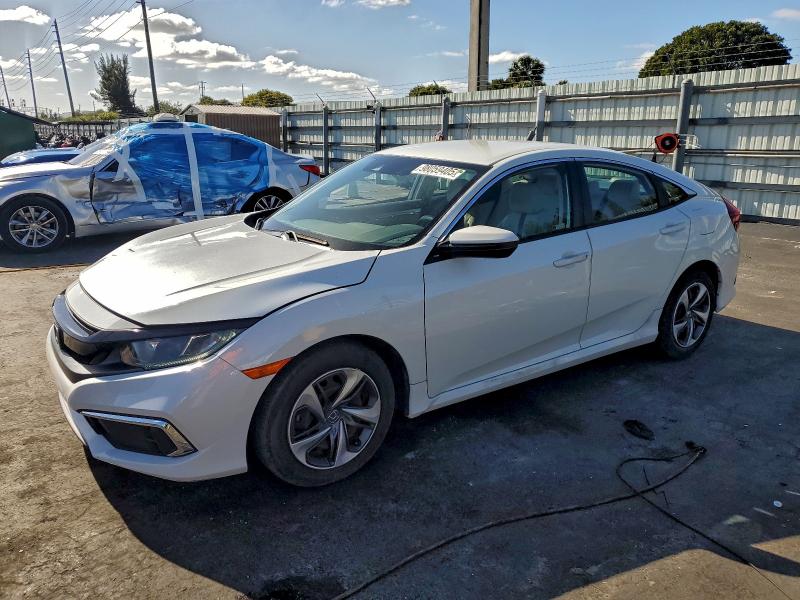 HONDA CIVIC LX 2020 with VIN 19XFC2F62LE021842 - Photo from auction
