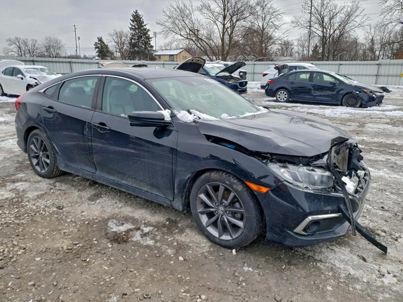 Photo 4 from auction – 2019 HONDA CIVIC EX with VIN 19XFC1F33KE007639