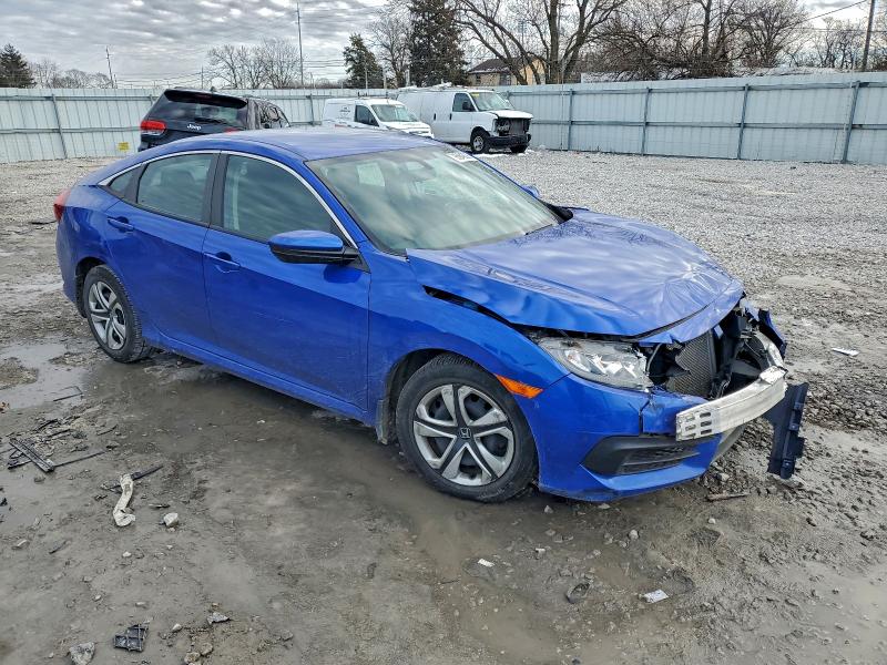 Photo 4 from auction – 2018 HONDA CIVIC LX with VIN 19XFC2F51JE040404