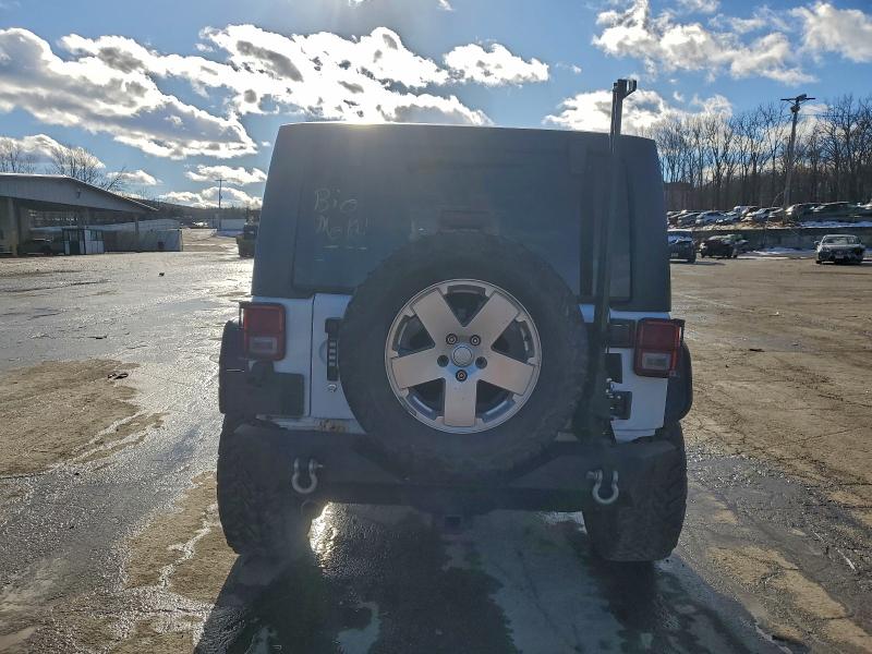 Photo 6 from auction – 2012 JEEP WRANGLER U with VIN 1C4BJWEG9CL125645