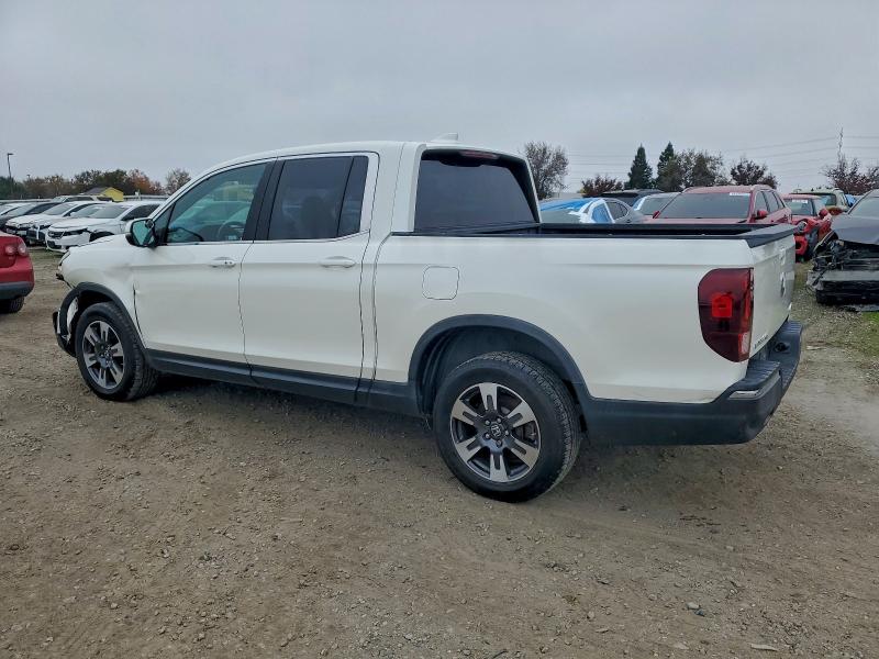 Photo 2 from auction – 2018 HONDA RIDGELINE with VIN 5FPYK3F68JB009372