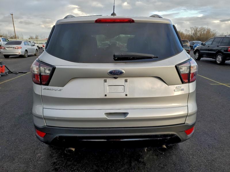 Photo 6 from auction – 2018 FORD ESCAPE with VIN 1FMCU9GD2JUB84622