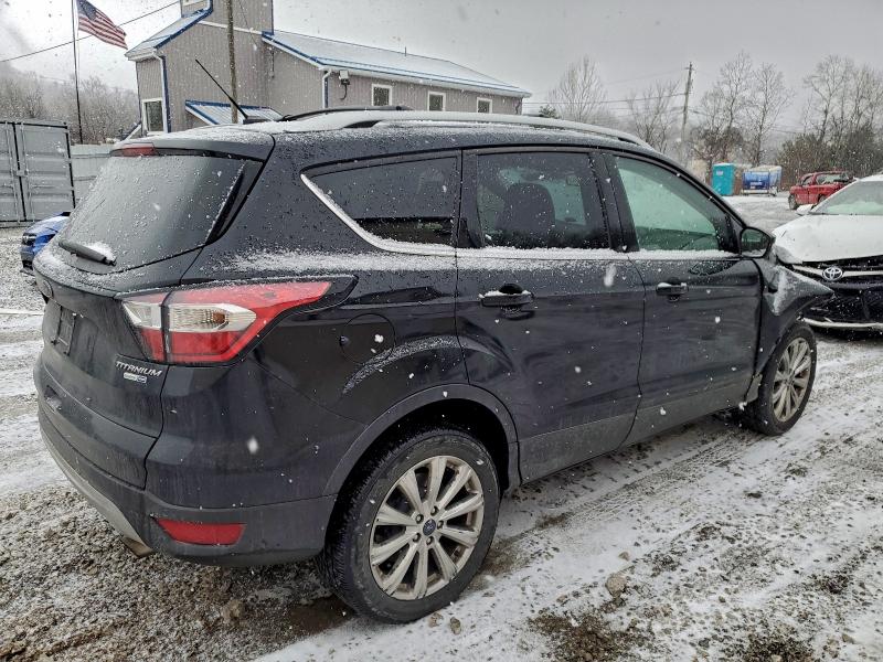 Photo 3 from auction – 2017 FORD ESCAPE TIT with VIN 1FMCU9JD0HUC32783