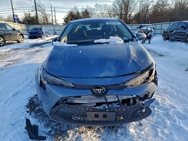 Photo 5 from auction – 2022 TOYOTA COROLLA LE with VIN JTDEPMAE6N3022092
