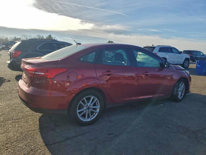Photo 3 from auction – 2016 FORD FOCUS SE with VIN 1FADP3F21GL261045